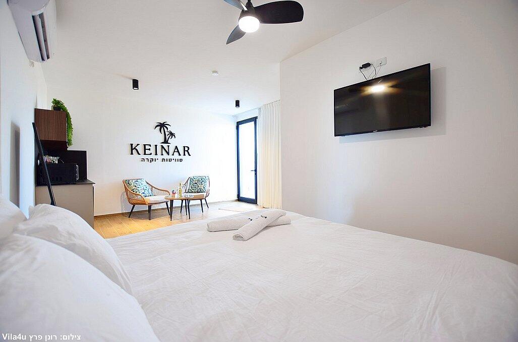 כינר סוויטות יוקרה - סוויטות עם מיטה זוגית רחבה